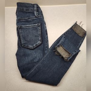 Good American raw ankle frayed jeans